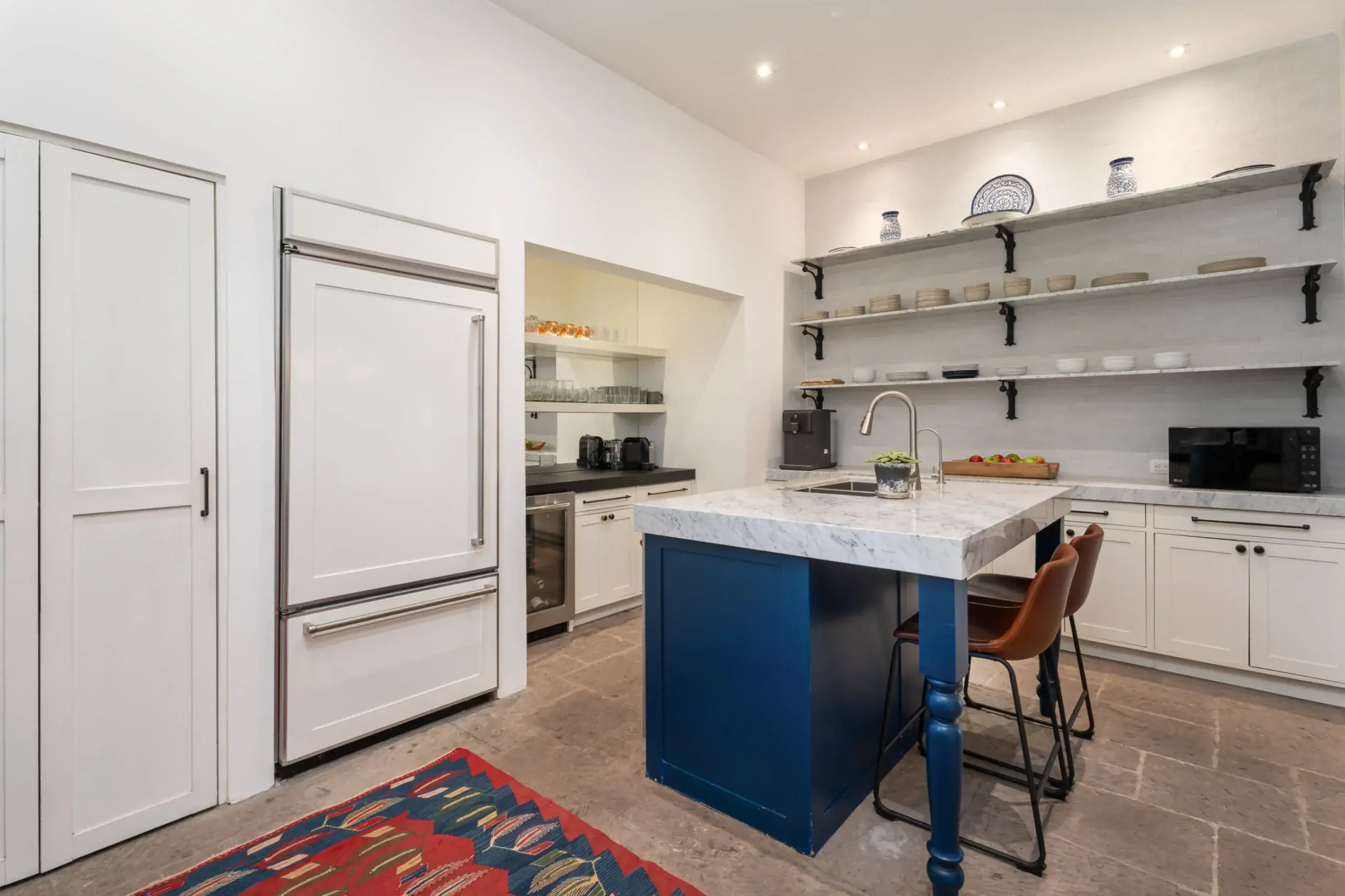 Casa Santa Mónica, kitchen island and open shelving, San Miguel de Allende