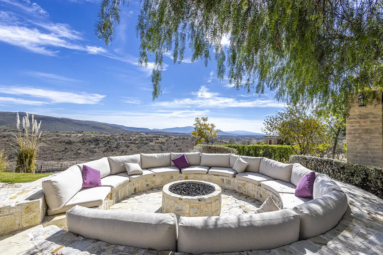 Mañanitas Residence, circular fire pit seating area with mountain views, San Miguel de Allende