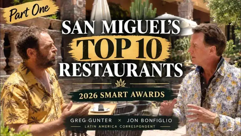 Greg Gunter and Jon Bonfiglio talking at a restaurant table, with the text 'Part One: San Miguel's Top 10 Restaurants, 2026 Smart Awards, Greg Gunter and Jon Bonfiglio, Latin America Correspondent'