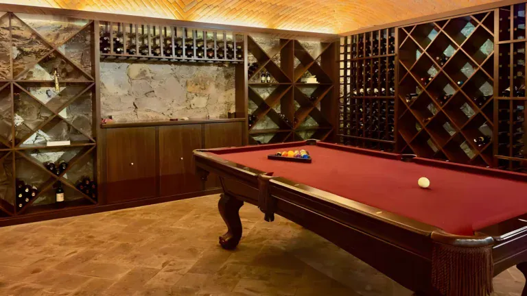 Raíz de las Nubes, game room with a pool table and a diagonal wine rack wall, San Miguel de Allende