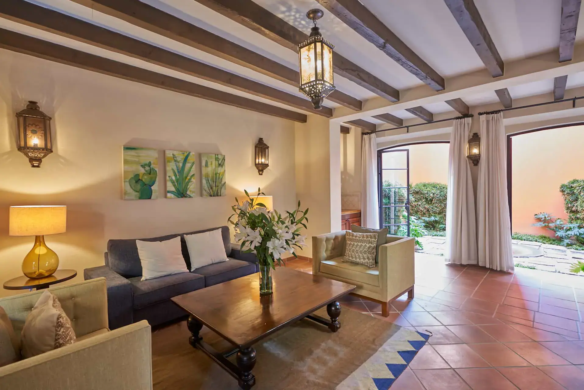 Rosewood Residence 7, sitting room with a sofa, a coffee table and a beamed ceiling, San Miguel de Allende