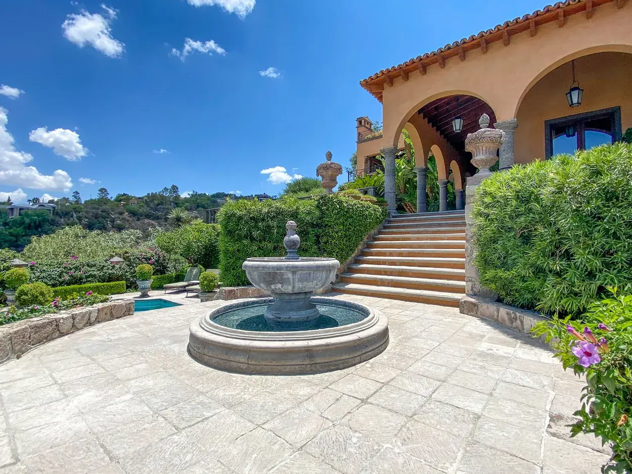 Villa Entre Sueños, stone fountain at the foot of a garden staircase, San Miguel de Allende