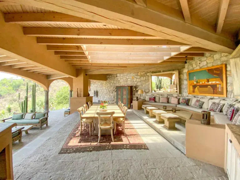Villa Entre Sueños, covered outdoor living and dining room with built-in sofas, San Miguel de Allende