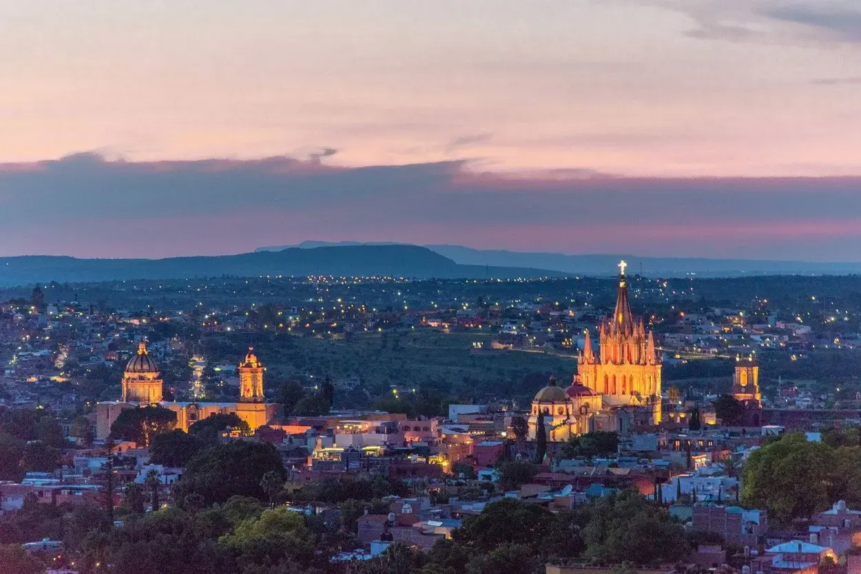 Villa Entre Sueños, view of the Parroquia and the city at dusk, San Miguel de Allende