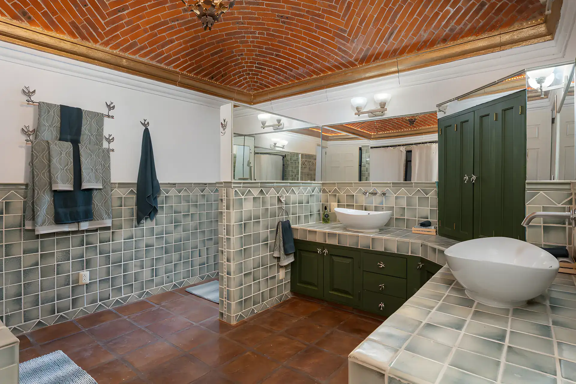 Villa Escondida, bathroom with a green tile vanity, vessel sink and a freestanding tub under a brick ceiling, San Miguel de Allende
