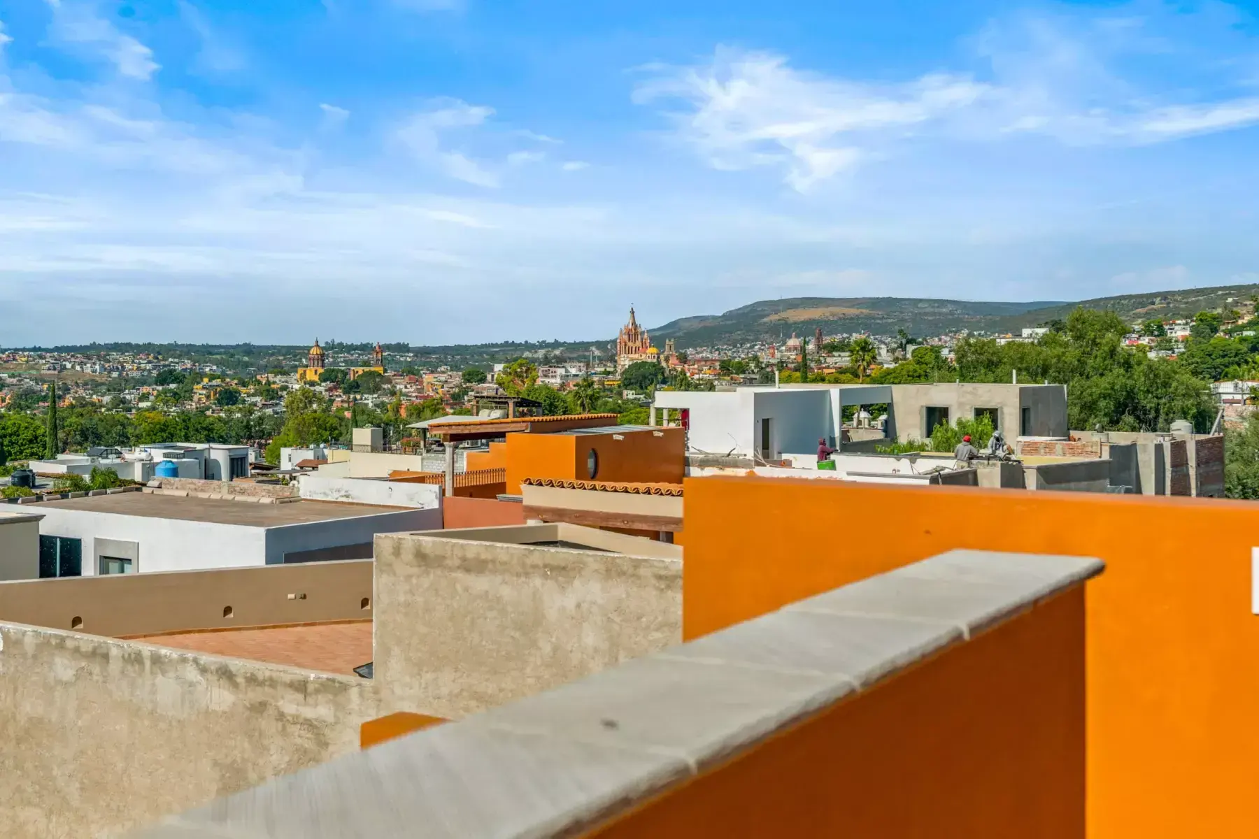 Villa Picasso, rooftop view of San Miguel de Allende with the Parroquia, the town and the hills