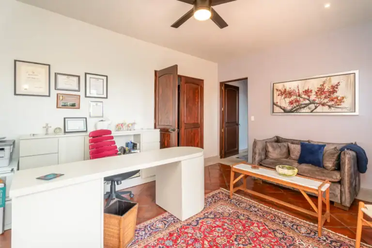 Villa Van Gogh, home office with a white desk and a built-in bookshelf, San Miguel de Allende